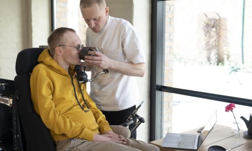 medium-shot-friend-helping-disabled-man